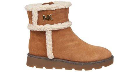 michael michael kors shearling ankle boots|Michael Kors cowboy boots.